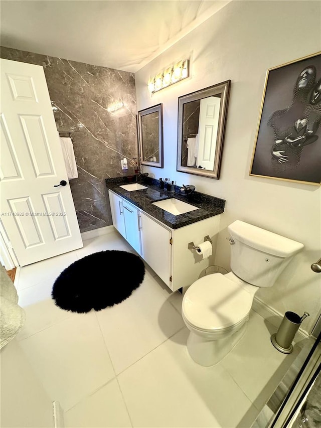 3850 Washington St Unit 317, Hollywood, FL 33021 - bathroom with vanity, tile patterned floors, and toilet