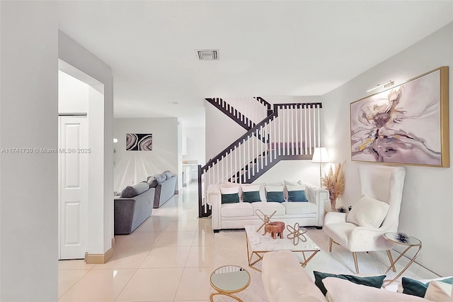 living room featuring light tile patterned floors