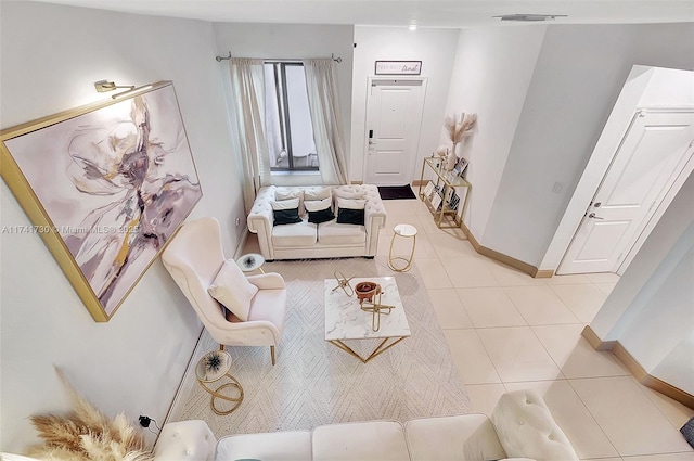 living room featuring light tile patterned flooring