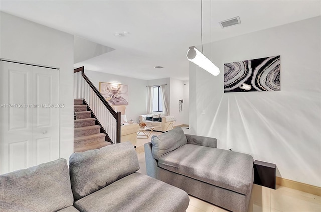 living room with light tile patterned floors