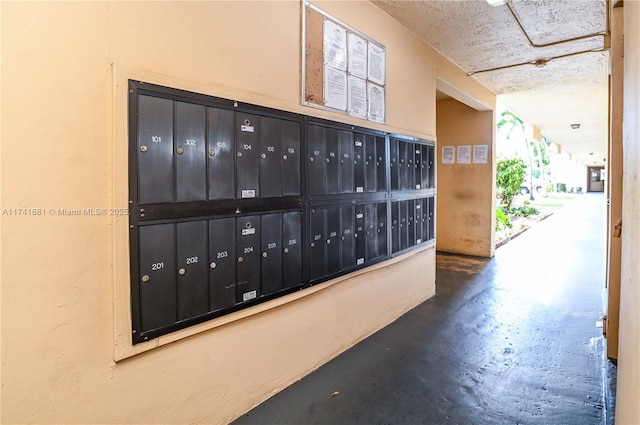 view of home's community featuring mail boxes