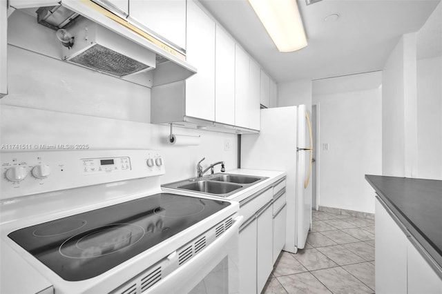 kitchen featuring white cabinetry, sink, electric range, and light tile patterned floors