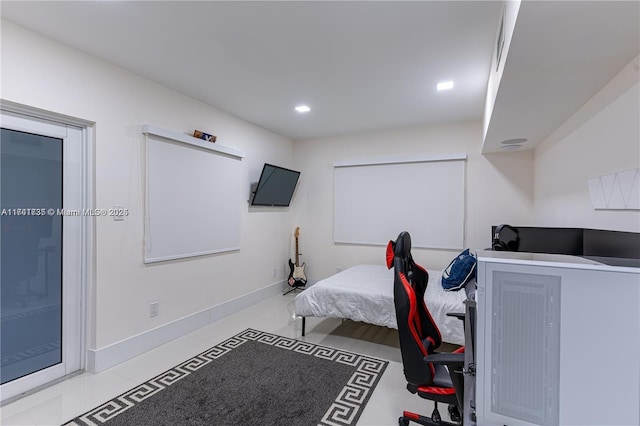 bedroom featuring light tile patterned floors