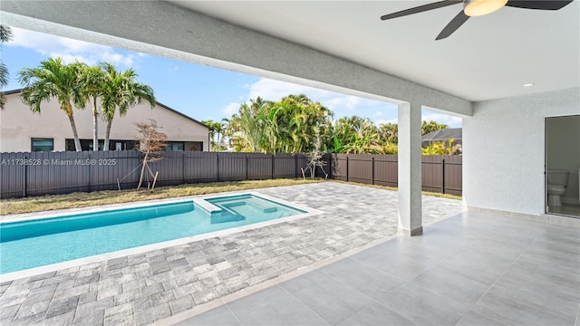 view of pool featuring a patio area and ceiling fan