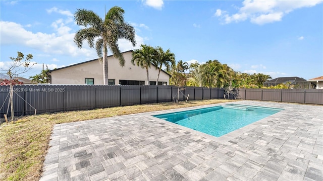 view of pool featuring a patio