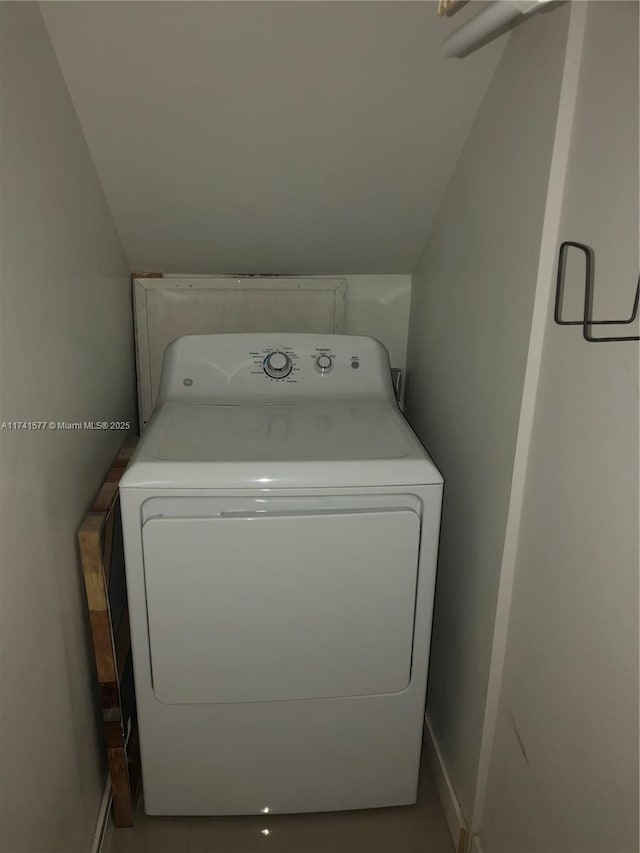 washroom featuring washer / clothes dryer