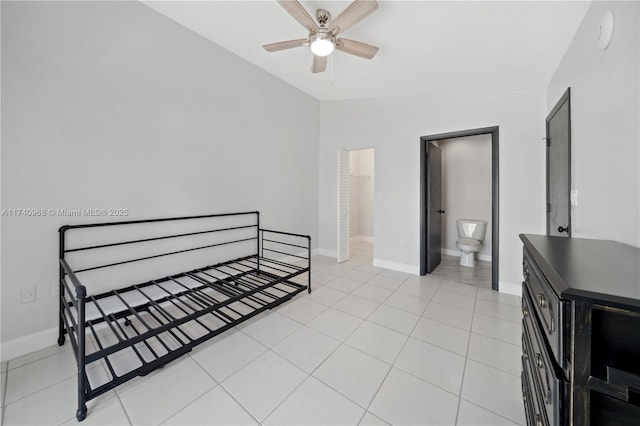 tiled bedroom featuring ceiling fan and lofted ceiling