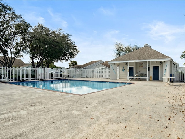 view of swimming pool featuring a patio area