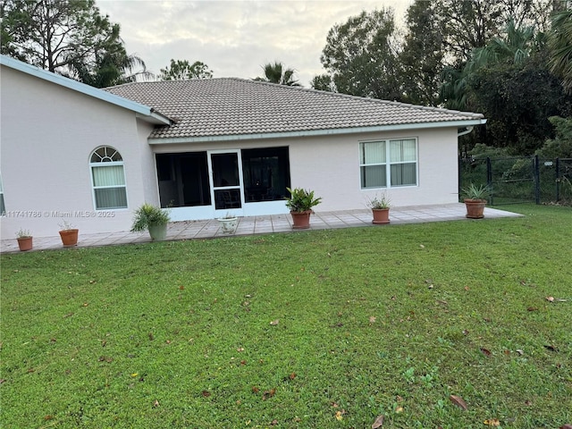 view of home's exterior featuring a lawn