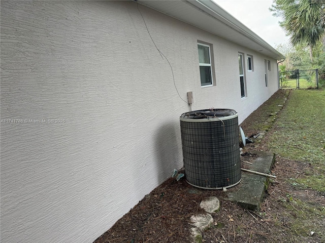 view of property exterior with central AC unit