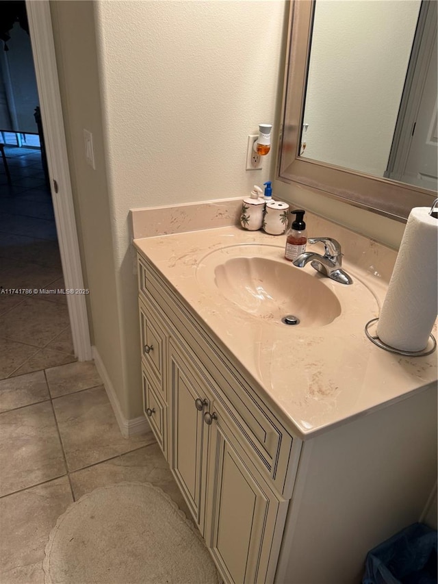 bathroom with vanity and tile patterned flooring