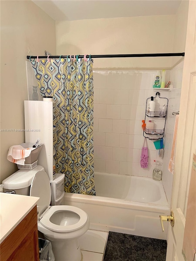 full bathroom with vanity, shower / bath combination with curtain, and toilet