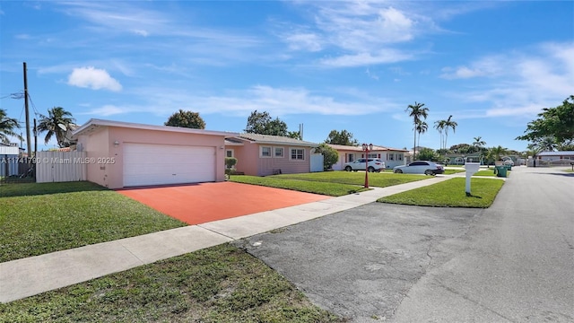 single story home with a front yard