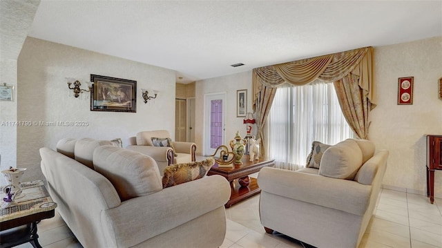 living room featuring light tile patterned flooring