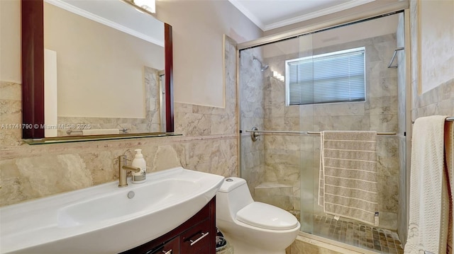 bathroom with walk in shower, toilet, crown molding, tile walls, and vanity