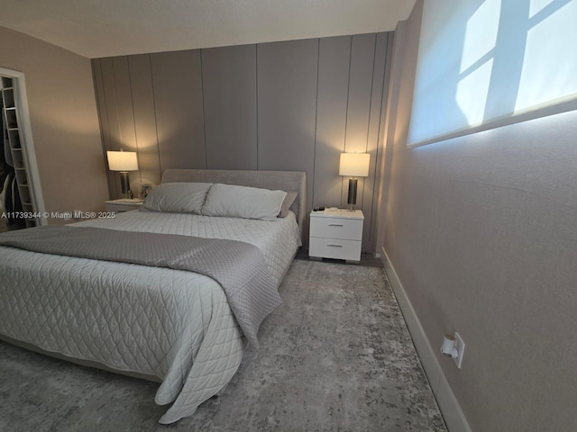 bedroom featuring light colored carpet