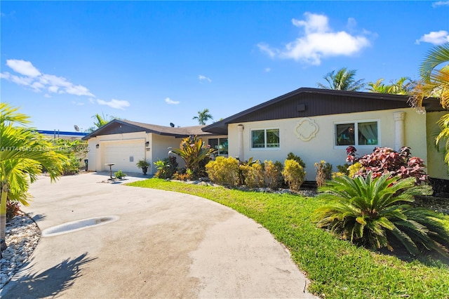 single story home with a garage