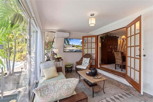 sitting room with french doors, ornamental molding, and an AC wall unit