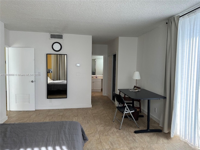 bedroom with a textured ceiling