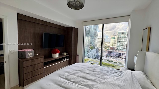 bedroom with expansive windows