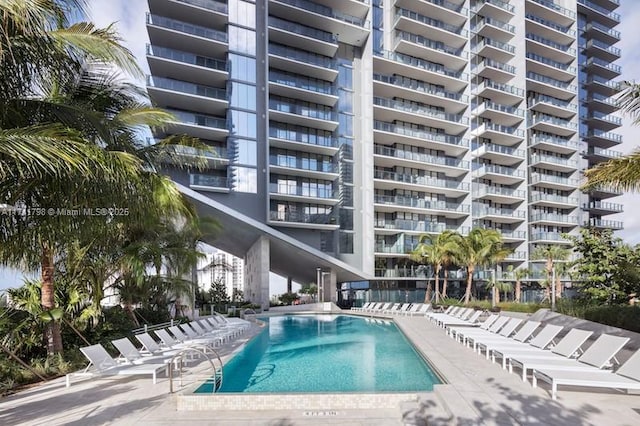 view of pool featuring a patio