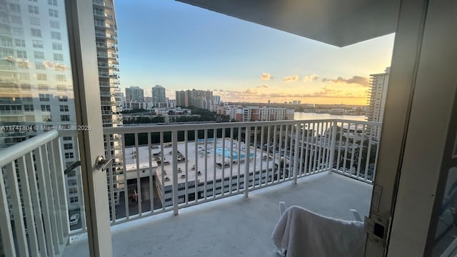 view of balcony at dusk