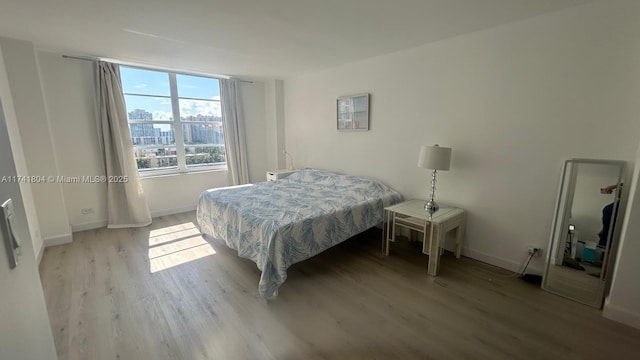 bedroom featuring light wood-type flooring