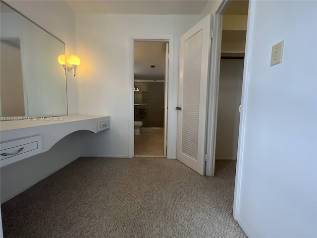 bathroom featuring toilet and a shower