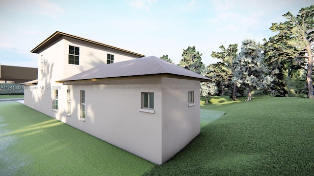 view of side of property featuring a lawn