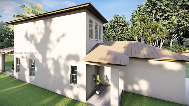 exterior space with a lawn