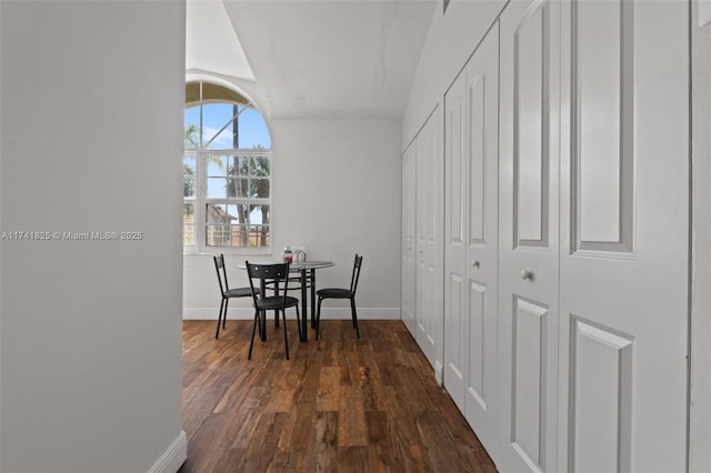 dining area featuring dark hardwood / wood-style floors