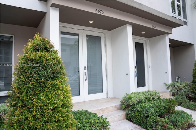 6475 NW 104th Ct Unit 6475, Doral, FL 33178 - property entrance with stucco siding and french doors