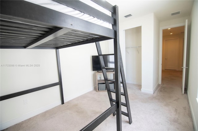 6475 NW 104th Ct Unit 6475, Doral, FL 33178 - unfurnished bedroom with light colored carpet and a closet
