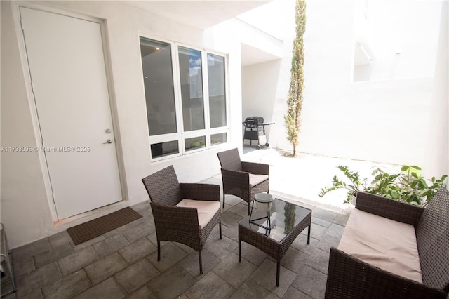 view of patio featuring grilling area and an outdoor hangout area