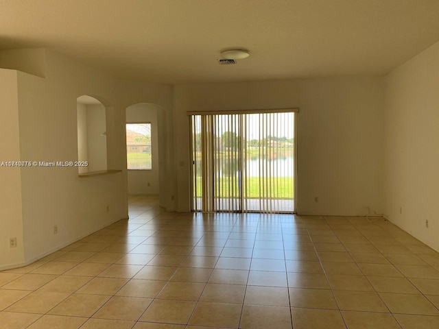 view of tiled spare room