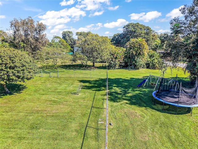 view of yard with a trampoline