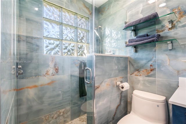 1601 SW 117th Ave, Davie, FL 33325 - bathroom featuring a shower stall, vanity, tile walls, and toilet