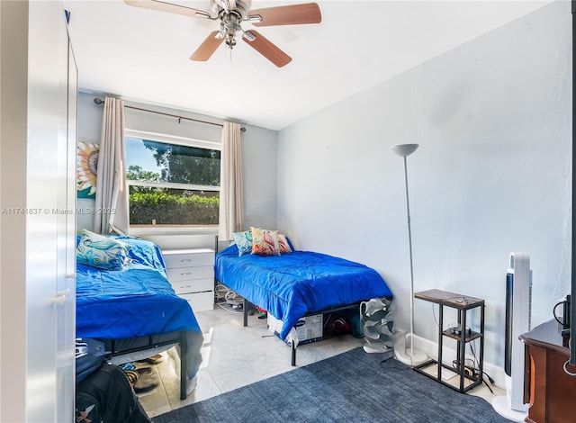 bedroom featuring ceiling fan