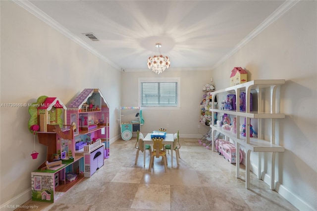 recreation room featuring a notable chandelier and crown molding