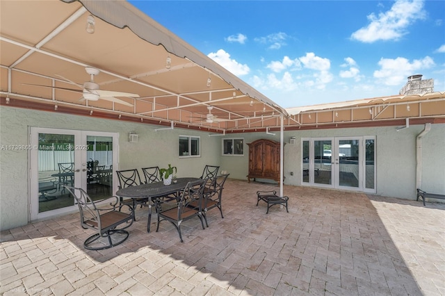 view of patio / terrace featuring french doors and ceiling fan