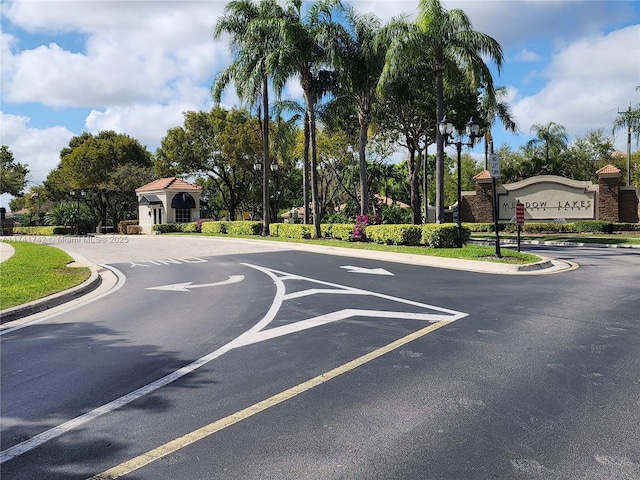 view of road featuring curbs