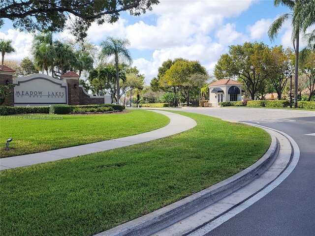 view of community with a yard