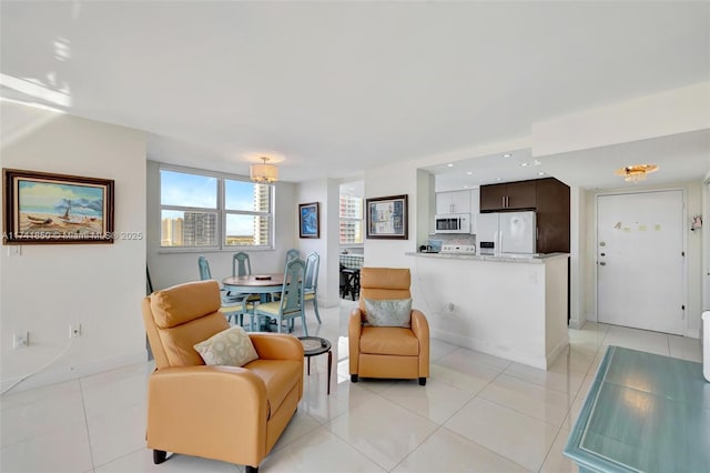 1833 S Ocean Dr Unit 1612, Hallandale Beach, FL 33009 - sitting room with recessed lighting, baseboards, and light tile patterned floors
