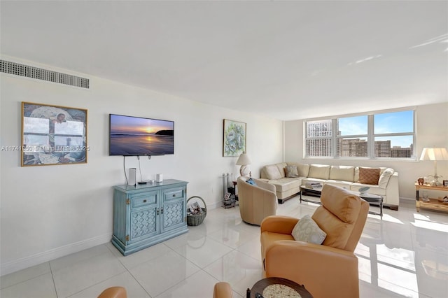 1833 S Ocean Dr Unit 1612, Hallandale Beach, FL 33009 - living room featuring visible vents, baseboards, and light tile patterned floors
