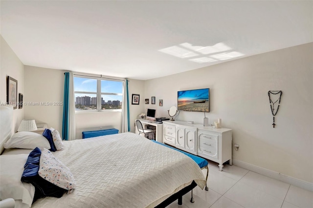1833 S Ocean Dr Unit 1612, Hallandale Beach, FL 33009 - bedroom featuring baseboards and light tile patterned floors
