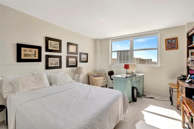 1833 S Ocean Dr Unit 1612, Hallandale Beach, FL 33009 - bedroom featuring baseboards and light tile patterned floors