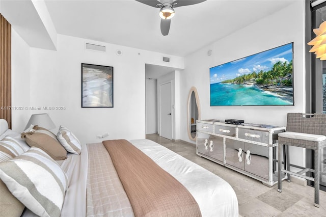 bedroom featuring arched walkways, visible vents, and ceiling fan