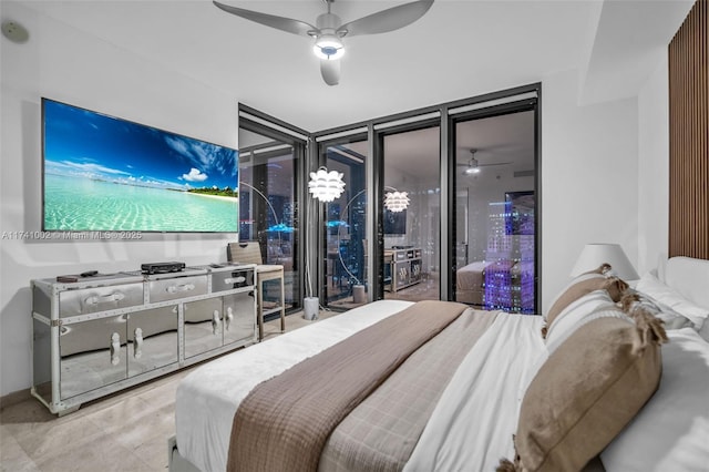 bedroom featuring floor to ceiling windows and a ceiling fan