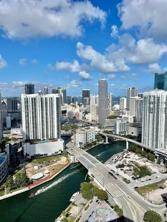 property's view of city with a water view