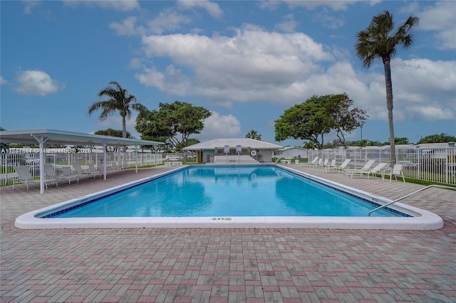 view of pool featuring a patio